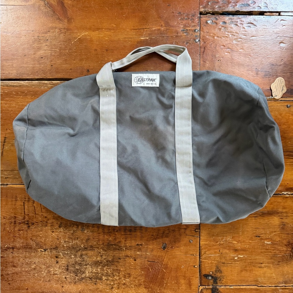 Eastpak Charcoal Canvas Duffel with Light Gray Straps